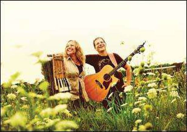 Acoustic folk duo to appear June 19 at 'art on The Green'