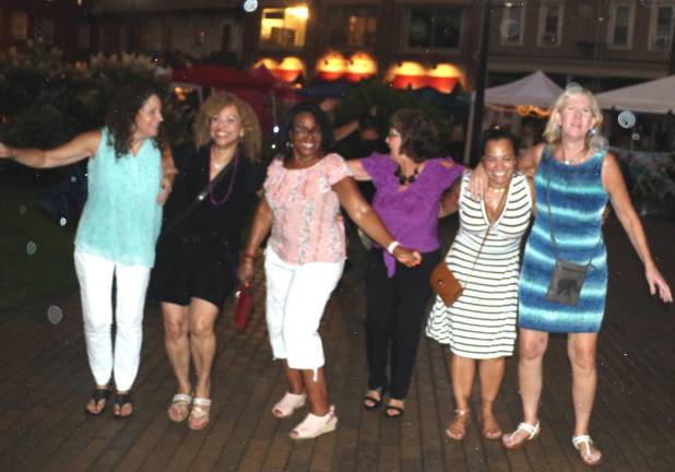 Although the bad weather returned later in the evening it didn’t dampen the spirits of those who had fun dancing in the rain on the Railroad Green.