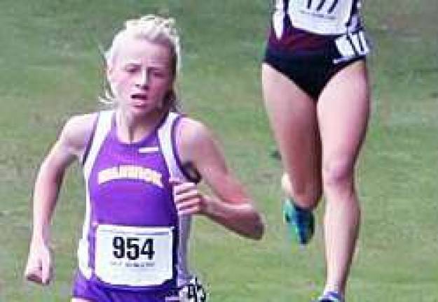 Photo provided by the Warwick Valley High School Athletic Department Warwick Valley High School freshman Megan Reilly won the NYSPHSAA Large School Individual Cross Country Championship in Buffalo last weekend with a time of 17:34.3.