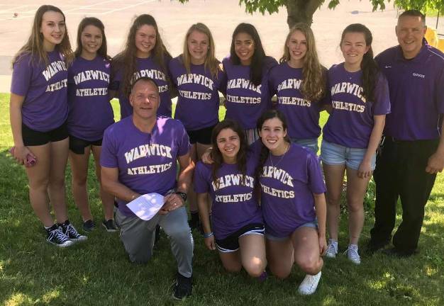The Warwick Valley Wildcat Girls Basketball Team earned the Purple and Gold 'AAA' Award for academics and athletic achievement as the top Varsity Scholar-Athletic Team in the school district.
