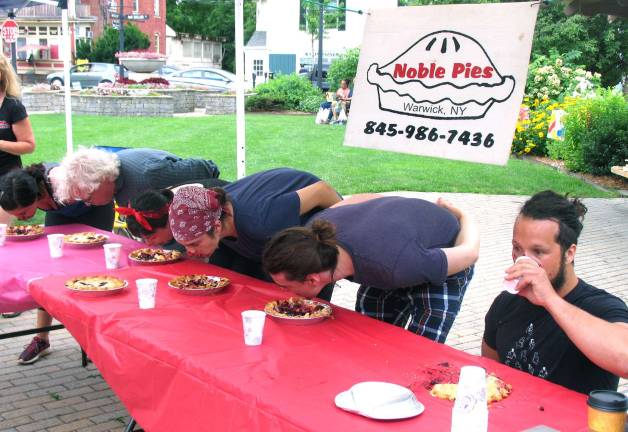 On Sunday there were pie-eating contests for both children and adults sponsored by Noble Pies.