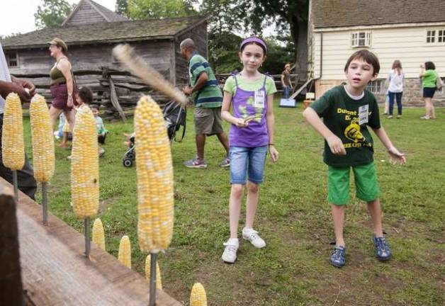 Playing Ring a Cob in the CORNival Games area.