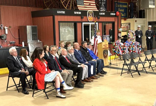 Officials gather to observe Memorial Day.
