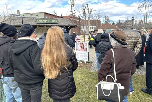 About 100 people gathered in Railroad Green on Jan. 11 for a vigil.
