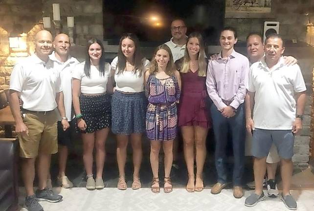 Pictured are members of the Central Orange County Italian American Association’s executive board and the recipients of the association’s scholarships. Provided photo.