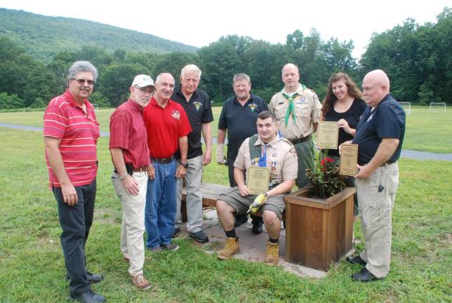 Left to right are: Russell Kowal; Michel Sweeton; James Gerstner; Denis Mulcahy; Eagle Scout Shea Gormley (seated); Sam Gormley; Scoutmaster Jason Fox; Kathleen Holder; and Vincent Hallinan.