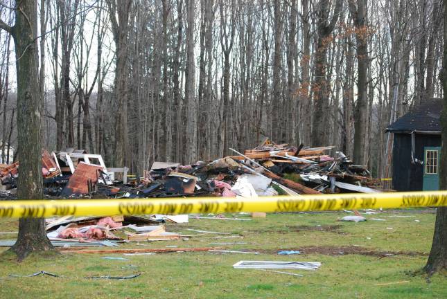 Photo by Becca Tucker This was all that remained of the Kunisch home on 91 Walling Road in Pine Island on Wednesday. The house exploded Tuesday afternoon.