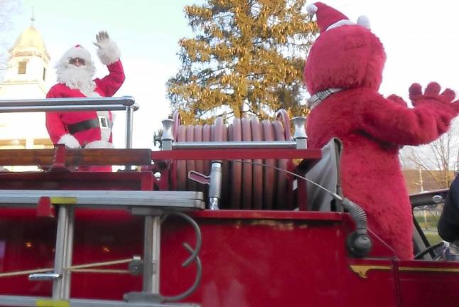 Santa showed up on a fire truck.