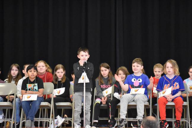 A speller considers his word during the 2024 Delaware Valley Elementary School spelling bee.