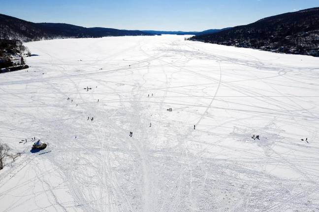 The Warwick Town Board was scheduled to vote Thursday night on a five-year renewable lease agreement with the Village of Greenwood Lake, where the village will manage and operate the Thomas Morahan Waterfront Park and Greenwood Lake Beach. This recent aerial photo by photographer Robert G. Breese shows the lake as a wintertime playground.
