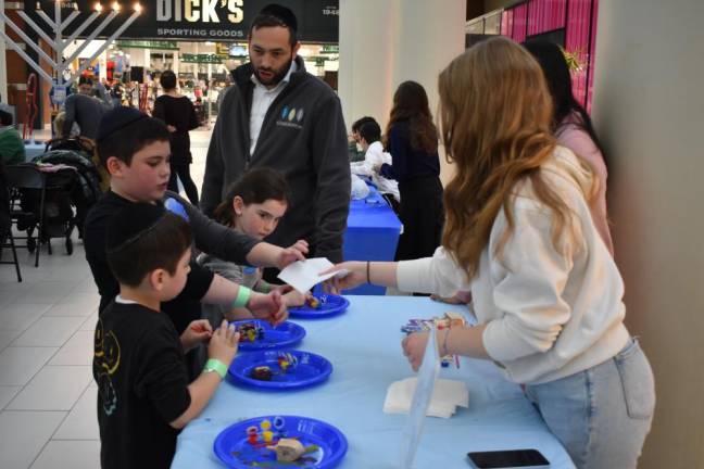 Dreidel painting was among the kids’ activities at the Chanukah Wonderland.