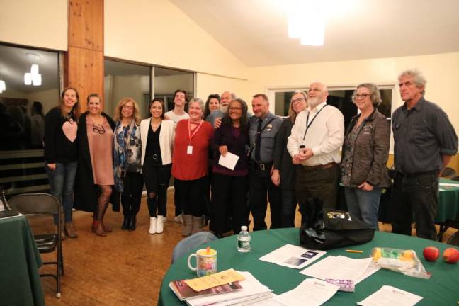 Beverly Braxton, sixth from left in first row, with Police Chief John Rader and others who spoke at the Mental Health Forum in November.