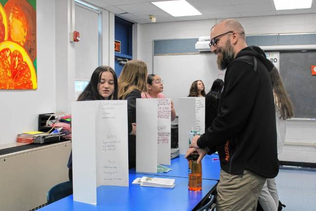 Principal Michael Maesano attends the mock career fair.