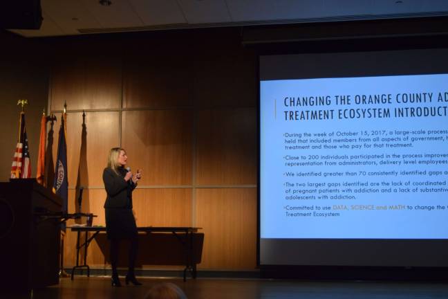 Photo by Erika Norton One of the main initiatives of Orange County's strategic partnership with healthcare partners to address opioid addiction is a new 24/7 hotline, according to Orange County Commissioner of Social Services and Mental Health Darcie Miller, who spoke at a seminar on Jan. 18.