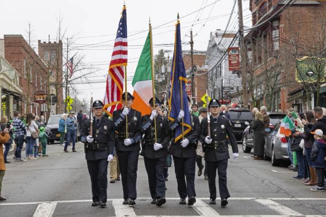 The Warwick police color guard led the front of the St. Patrick’s Day parade in the Village of Warwick.