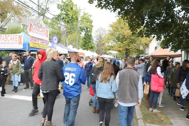 View of South Street and food vendors looking toward the downtown area of the Village of Warwick.