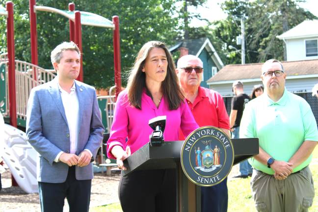 Sen. James Skoufis joins Superintendent Sarah Hadden, Greenwood Lake Mayor Thomas Howley and members of the Greenwood Lake school board to announce state funding for the district’s clubs and field trips.