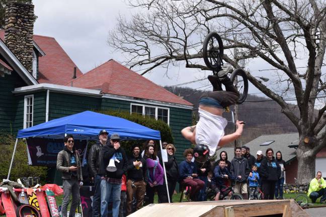 Vinny Carrozza performs a back flip on his way to winning the BMX Open Jam Session at the Do It For Dale Skate Contest.