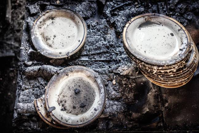Tne suspect used beer bottles filled with gasoline to make Molotov cocktails, according to police reports.