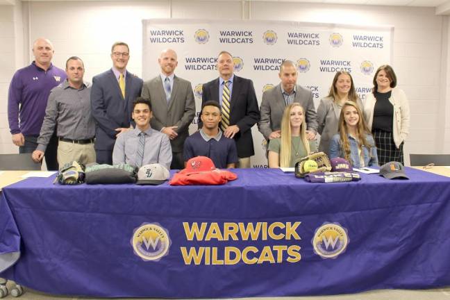 Seated, from left: students Brandon Ortiz, Devin Boone, Hannah Hennessy and Gabriella Rusek. Standing, from left: coaches Dennis Mclaughlin, Eric Rosa, Jeff Jacobsen and Peter Scheuermann, Athletic Director Gregory Sirico, coaches Matt Carcaterra and Jill Ferro and Principal Marguerite Fusco.