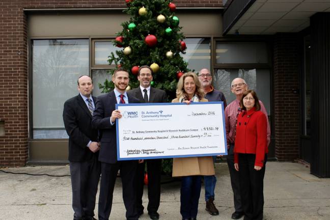 Warwick Health Foundation board members present a check to Michael Becker, administrator of Mount Alverno Center, and Judy Lindberg, vice president of Patient Care Services, St. Anthony Community Hospital. Pictured here from left are Michael Becker, Jacob Tuckfelt, Garrett Durland, Jane Brief, Frank Petrucci, Doug Stage, and Judy Lindberg.