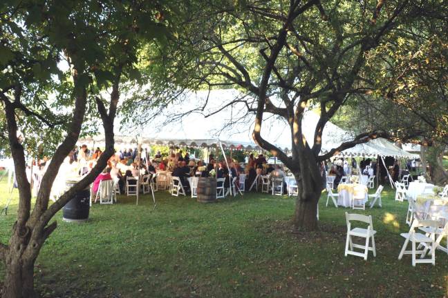 On Saturday evening, Aug. 24, almost 200 guests gathered both outside and under the tent in Lewis Park in the Village of Warwick for the Warwick Historical Society's 48th annual Party in the Park.