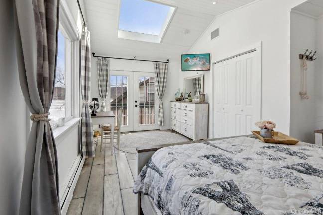 Spacious, vibrant space with lake views