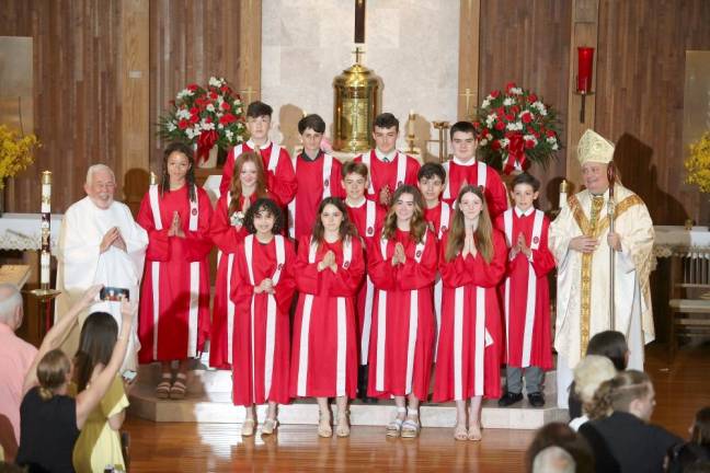 Pictured with Bishop John Bonnici and Fr. Augustine Badgley are the thirteen students who received the Sacrament of Confirmation at Holy Rosary in Greenwood Lake on Sunday, May 22, 2022. 1st Row: Isabella Bonacarti, Madison Fox, Madelyn McCormack &amp; Saoirse Trazino. 2nd Row: Juliet Thomas, Hannah Gardiner, Jordan Marsh-Clifford, Anthony Apuzzo and Brandon Nowak. 3rd Row: Vincent Velez, Carlo Scotto, Phillip Gargiulo and Logan Wall.