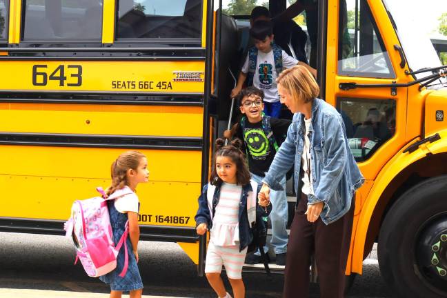 Students arrive at Golden Hill Elementary School.