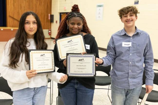 (L-R) Izgi Bogubaev from Monroe-Woodbury Middle School, Keturah Jordan from Washingtonville Middle School and Joseph Veltri of Chester Academy tied for second place in this year’s regional spelling bee.
