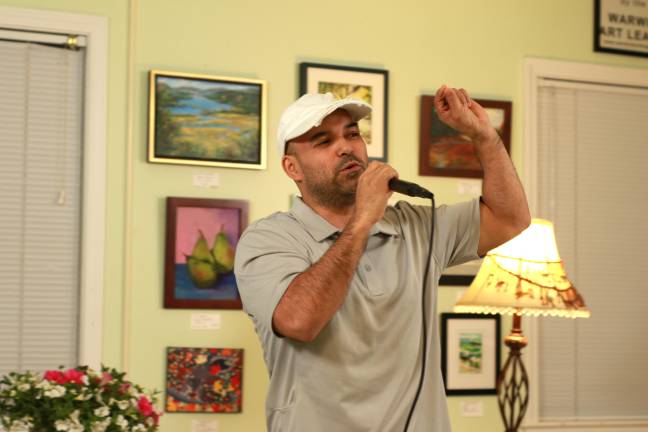 Daniel Gesture captivates the audience at a recent Story Share event.