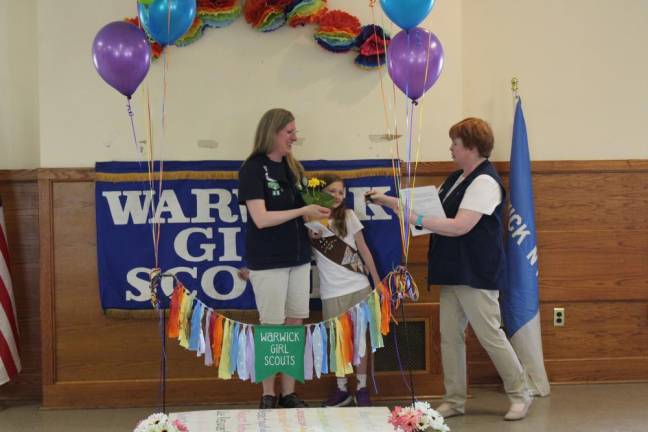 Warwick Service Unit Secretary Emily Montenaro, left, received the Volunteer of Excellence Award for her service to the Girl Scout community (pictured with her daughter and Warwick Service Unit Manager Eileen Verboys).