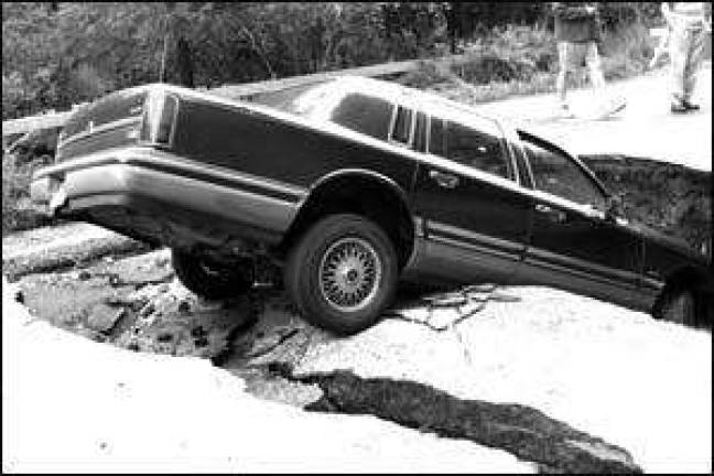 How did this car end up in the hole?