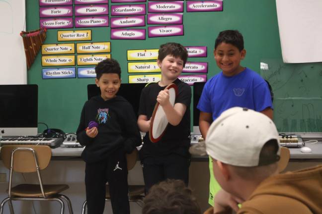 Fourth graders perform original blues pieces.