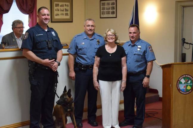 Left to right: Officer Kerstner, Fritz, First Sgt. Alton Morley, Diane Bramich and Police Chief John Rader.