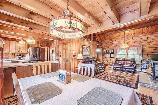 Bucolic and stylish log home on nine acres