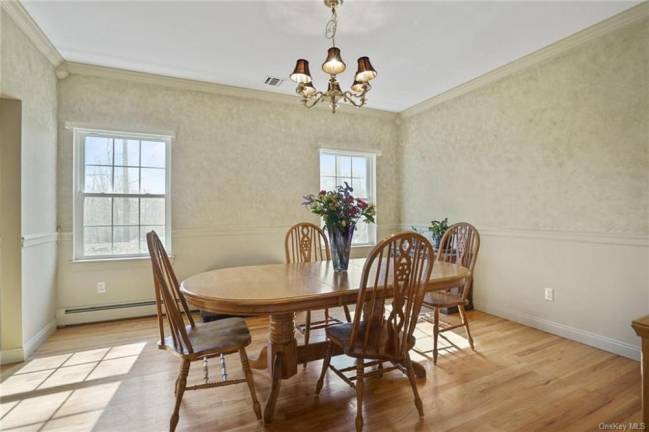 Call this four-bedroom Colonial home