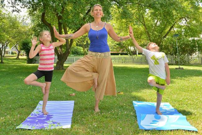 Provided photo Beginning Tuesday, June 13, join the Warwick Historical Society and Vastu Yoga for an outdoor summer yoga series on the lawn in Lewis Park on Main Street in Warwick.