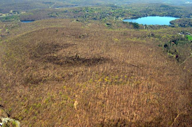 Photo Credit: OCLT/Lighthawk This aerial photograph shows Cairn Mountain, located in the northernmost portion of the 961-acre conserved lands in Tuxedo.