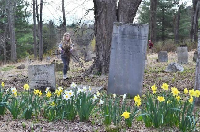 This Warwick resident participates in the community effort to remove debris from the Amity Cemetery on Sat., Apr. 23.