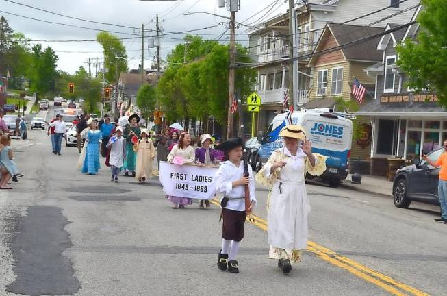 Parade marchers wore 1800s attire in celebration of William Henry Seward Day.