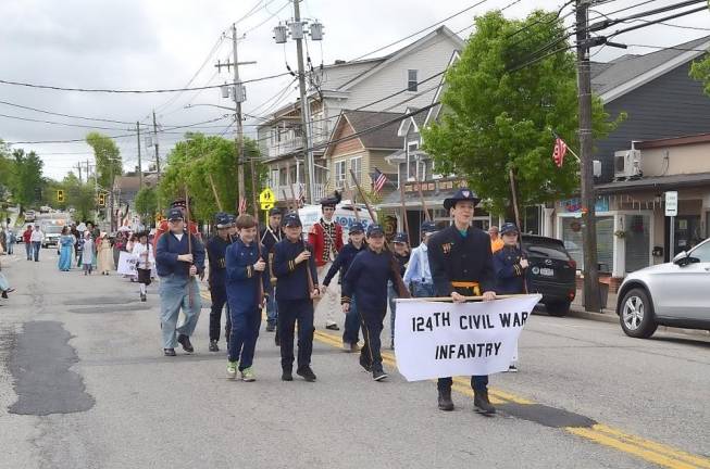 Re-enactors of the 124th Civil War Infantry marched in the William Henry Seward Day Parade.