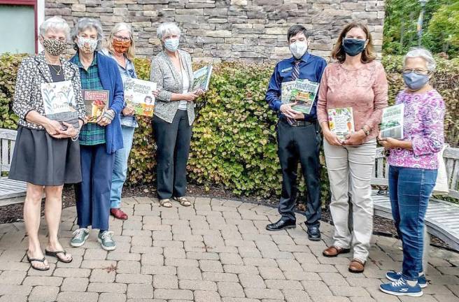 Marcela Gross, Camille Tanzella, Cathy Garofalo, Albert Wisner Public Library Director Rosemary Cooper, Florida Library Public Library librarian Baaron Angell, WVG President Laurie Unick and Nilda Ramos. Provided photo.