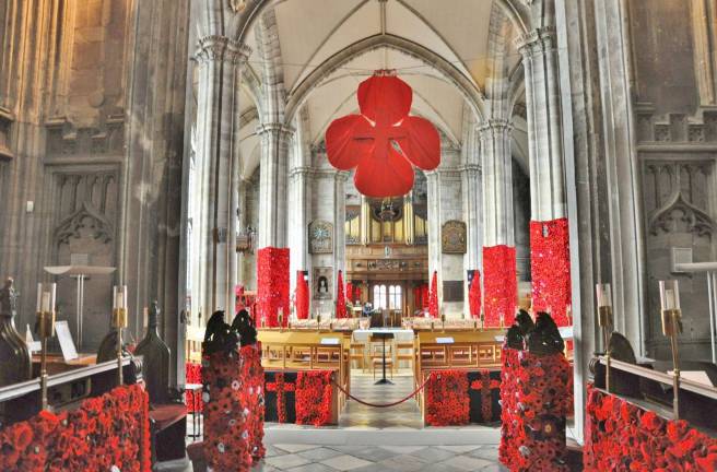 St. Mary's Collegiate Church in Warwick, United Kingdom, with its display of thousands of poppies, including more than 600 created by residents of Warwick, N.Y.