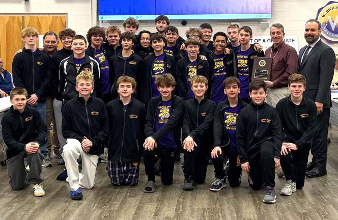 The Warwick Valley High School boys varsity swimming and diving team is honored by the BOE.