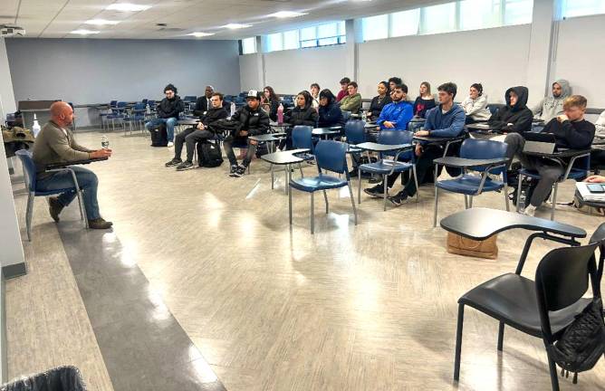 Orange County business owner Frank Volpe speaks Mount Saint Mary College Business Capstone and Production/Operations Management classes.