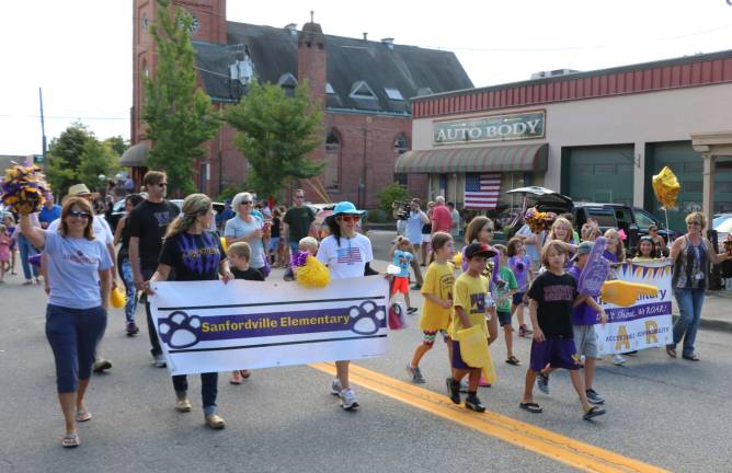 Sanfordville Elementary School staff and students march in the parade.