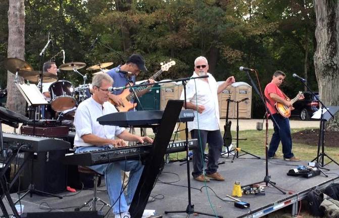Tangent performs at Pennings 40th Anniversary Party this weekend.