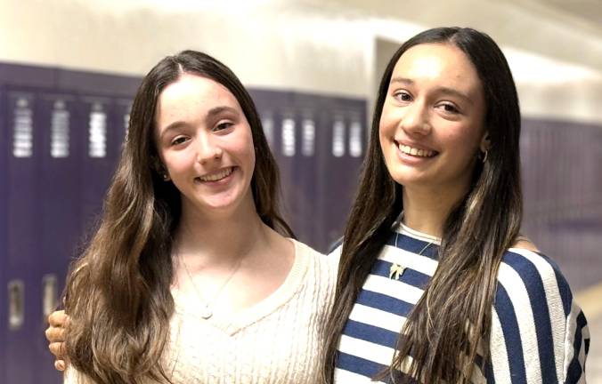 WVHS students Emma Giglio and Olivia Zottola balance school and extracurricular activities with a strong dedication to gymnastics.