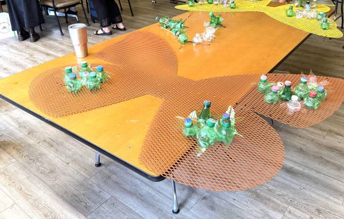 Summer Youth Leadership Academy used recycled bottles to adorn the wings of the butterfly chairs.
